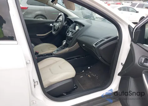 2016 Ford Focus Titanium z USA, uszkodzony, nr VIN 1FADP3N26GL222971